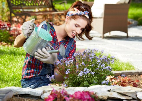 Worker wearing protective equipment during gardening task